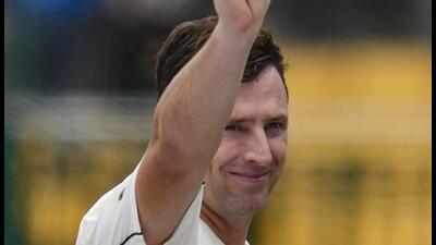 New Zealand's Matt Henry shows the ball after taking a five-wicket haul against India. (PTI) New Zealand's Matt Henry shows the ball after taking a five-wicket haul against India. (PTI)