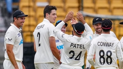 New Zealand's William O'Rourke celebrates with teammates after taking the wicket of India's Virat Kohli during the second day of the first Test cricket match (PTI) New Zealand's William O'Rourke celebrates with teammates after taking the wicket of India's Virat Kohli during the second day of the first Test cricket match (PTI)