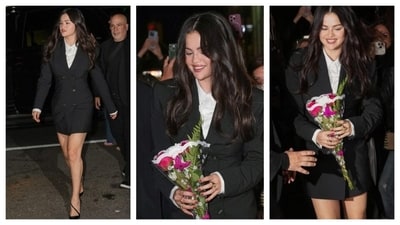 Selena Gomez aced a blazer dress look, looking graceful with a confident poise. It had a formal, corporate chic energy that was classy and beautiful. She completed the look with black heels, carrying the monochrome look well.&nbsp; (Instagram/@erinwalshstyle)
