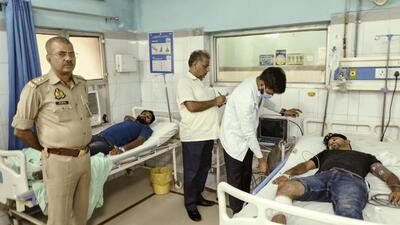 The accused receive treatment after the encounter, in Bahraich on Thursday. (PTI) The accused receive treatment after the encounter, in Bahraich on Thursday. (PTI)
