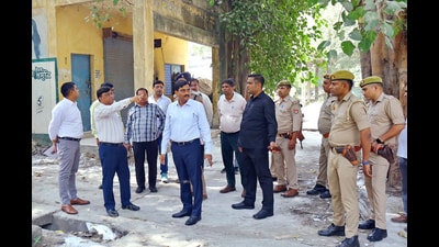 The district administration officials inspect the Govindpuram rice market in Ghaziabad on Thursday. It is here that the EVMS will be stored and the counting will also take place. (Sakib Ali /HT Photo) The district administration officials inspect the Govindpuram rice market in Ghaziabad on Thursday. It is here that the EVMS will be stored and the counting will also take place. (Sakib Ali /HT Photo)