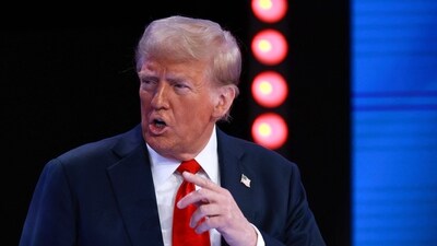 DORAL, FLORIDA - OCTOBER 16: Republican presidential nominee, former U.S. President Donald Trump speaks during a Univision Noticias town hall event on October 16, 2024 in Doral, Florida. Trump addressed undecided Latino voters as he continues campaigning against his rival, Democratic presidential nominee, U.S. Vice President Kamala Harris. Joe Raedle/Getty Images/AFP (Photo by JOE RAEDLE / GETTY IMAGES NORTH AMERICA / Getty Images via AFP) (Getty Images via AFP) DORAL, FLORIDA - OCTOBER 16: Republican presidential nominee, former U.S. President Donald Trump speaks during a Univision Noticias town hall event on October 16, 2024 in Doral, Florida. Trump addressed undecided Latino voters as he continues campaigning against his rival, Democratic presidential nominee, U.S. Vice President Kamala Harris. Joe Raedle/Getty Images/AFP (Photo by JOE RAEDLE / GETTY IMAGES NORTH AMERICA / Getty Images via AFP) (Getty Images via AFP)