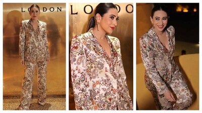 Karisma Kapoor wore an elegant printed pantsuit with an eclectic mix of floral patterns and vibrant colors on both the trousers and blazer. The blazer had a deep V-neckline and broad lapels, giving the outfit a sophisticated look. She styled her hair in a sleek ponytail, which complemented the formal floral ensemble perfectly. (Instagram/@therealkarismakapoor)