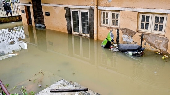 View of a partially submerged house following heavy rainfall, in Bengaluru on Wednesday. (ANI Photos) (Savitha)