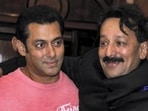 In this July 21, 2013 file photo, then Congress leader Baba Siddique with actor Salman Khan during an Iftar party in Mumbai. Three unidentified persons fired at and injured Baba Siddiqui of the Ajit Pawar-led NCP in Mumbai's Bandra East on Saturday evening. In this July 21, 2013 file photo, then Congress leader Baba Siddique with actor Salman Khan during an Iftar party in Mumbai. Three unidentified persons fired at and injured Baba Siddiqui of the Ajit Pawar-led NCP in Mumbai's Bandra East on Saturday evening.