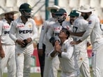 Pakistan's Noman Ali, center bottom, celebrates as he is congratulated by teammates after he took his fifth wicket during the fourth day of the second test cricket match between Pakistan and England, in Multan, Pakistan Pakistan's Noman Ali, center bottom, celebrates as he is congratulated by teammates after he took his fifth wicket during the fourth day of the second test cricket match between Pakistan and England, in Multan, Pakistan