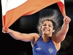 Malik celebrates gold at the 2022 Commonwealth Games in Birmingham. Six years earlier, she won bronze at the Rio Games, the first Indian woman to win an Olympic medal in wrestling. (Getty Images)