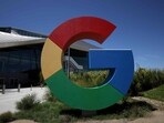 The Google logo is displayed in front of company headquarters in Mountain View, California.