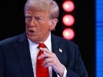 D: Republican presidential nominee, former U.S. President Donald Trump speaks during a Univision Noticias town hall event on October 16, 2024 in Doral, Florida.