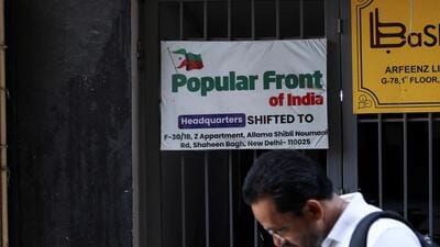 A man walks past the old office of Popular Front of India (PFI) Islamic group in India, (REUTERS FILE PHOTO) A man walks past the old office of Popular Front of India (PFI) Islamic group in India, (REUTERS FILE PHOTO)