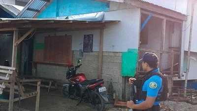 In this photo provided by the Philippine National Police Regional Office 9, a policeman checks an area Friday Oct. 18, 2024, where an American identified as Elliot Onil Eastman, from Vermont, was reportedly abducted by gunmen in Sibuco town, Zamboanga del Norte province, southern Philippines.) (AP)