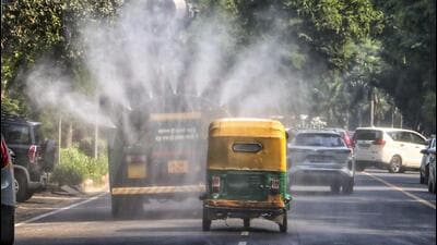 An anti-smog gun being used to spray water droplets to curb air pollution, in New Delhi, on Friday. (PTI) An anti-smog gun being used to spray water droplets to curb air pollution, in New Delhi, on Friday. (PTI)