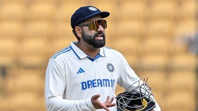 India's captain Rohit Sharma gestures during the third day of the first Test cricket match gainst New Zealand at the M. Chinnaswamy Stadium in Bengaluru (AFP) India's captain Rohit Sharma gestures during the third day of the first Test cricket match gainst New Zealand at the M. Chinnaswamy Stadium in Bengaluru (AFP)