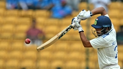 OUT! TAKEN! A catch out of thin air from the substitute fielder Michael Bracewell and India have been bundled out for 46 runs, their third-lowest total in Test cricket. Matt Henry stays around the stumps and bangs it in just a bit, keeping the line tight around off. Kuldeep Yadav hangs back to angle it away but doesn't quite keep it down. Bracewell at backward point just goes down to his left and snares it with his left hand. The resistance from Yadav ends and Henry gets a well-deserved five-for, also making it 100 wickets in Test matches. (AFP) OUT! TAKEN! A catch out of thin air from the substitute fielder Michael Bracewell and India have been bundled out for 46 runs, their third-lowest total in Test cricket. Matt Henry stays around the stumps and bangs it in just a bit, keeping the line tight around off. Kuldeep Yadav hangs back to angle it away but doesn't quite keep it down. Bracewell at backward point just goes down to his left and snares it with his left hand. The resistance from Yadav ends and Henry gets a well-deserved five-for, also making it 100 wickets in Test matches. (AFP)