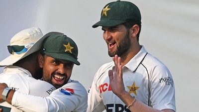 Pakistan's Aamer Jamal celebrates with teammates Babar Azam (C) and Shaheen Shah Afridi (R) (AFP) Pakistan's Aamer Jamal celebrates with teammates Babar Azam (C) and Shaheen Shah Afridi (R) (AFP)