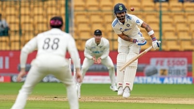 OUT! TAKEN! GONE! A huge, huge blow for India. The backward short leg was tactically kept in place for O'Rourke. This is on a good length, jagging back into the batter with an extra bit of bounce off the surface. Kohli rises with the bounce on the back foot and is hurried into the shot to play across. Also, the bottom hand comes off the bat and fends it off the gloves to the backward short leg fielder. Glenn Phillips dives forward and just about manages to keep his fingers underneath the ball. The replays confirm the same and Kohli walks back for a duck. William O'Rourke with a wicket-maiden to start his spell! (AP) OUT! TAKEN! GONE! A huge, huge blow for India. The backward short leg was tactically kept in place for O'Rourke. This is on a good length, jagging back into the batter with an extra bit of bounce off the surface. Kohli rises with the bounce on the back foot and is hurried into the shot to play across. Also, the bottom hand comes off the bat and fends it off the gloves to the backward short leg fielder. Glenn Phillips dives forward and just about manages to keep his fingers underneath the ball. The replays confirm the same and Kohli walks back for a duck. William O'Rourke with a wicket-maiden to start his spell! (AP)