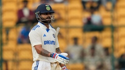 India's Virat Kohli returns to the pavilion after being dismissed by New Zealand's Glenn Phillips on the third day of the first test cricket match against New Zealand at the M Chinnaswamy Stadium in Bengaluru (PTI) India's Virat Kohli returns to the pavilion after being dismissed by New Zealand's Glenn Phillips on the third day of the first test cricket match against New Zealand at the M Chinnaswamy Stadium in Bengaluru (PTI)