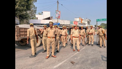 Police keep vigil in violence-hit Bahraich district on Friday. (PTI) Police keep vigil in violence-hit Bahraich district on Friday. (PTI)
