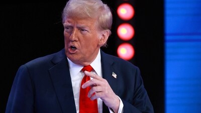 D: Republican presidential nominee, former U.S. President Donald Trump speaks during a Univision Noticias town hall event on October 16, 2024 in Doral, Florida. (Getty Images via AFP) D: Republican presidential nominee, former U.S. President Donald Trump speaks during a Univision Noticias town hall event on October 16, 2024 in Doral, Florida. (Getty Images via AFP)