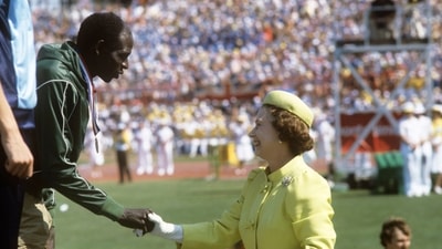 Queen Elizabeth II congratulates one of the athletes during a medal ceremony at the 1982 Commonwealth Games in Brisbane (Ron Bell/PA) Queen Elizabeth II congratulates one of the athletes during a medal ceremony at the 1982 Commonwealth Games in Brisbane (Ron Bell/PA)