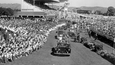Queen Elizabeth II and the Duke of Edinburgh stand in an open Rolls Royce at Victoria Park racecourse in Adelaide, as 75,000 schoolchildren gave a rousing welcome in 1963 (PA) Queen Elizabeth II and the Duke of Edinburgh stand in an open Rolls Royce at Victoria Park racecourse in Adelaide, as 75,000 schoolchildren gave a rousing welcome in 1963 (PA)