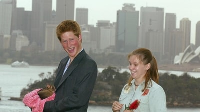 Prince Harry holds a ring-tailed possum with help from zookeeper Megan during a photocall at Taronga Zoo in Sydney to mark the start of his gap year in 2003 (Phil Noble/PA) Prince Harry holds a ring-tailed possum with help from zookeeper Megan during a photocall at Taronga Zoo in Sydney to mark the start of his gap year in 2003 (Phil Noble/PA)