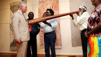 The Prince of Wales takes part in a didgeridoo demonstration during a visit to the Buku-Larrnggay Mulka Centre in Yirrkala in Australia’s Northern Territory in 2018 (Phil Noble/PA) The Prince of Wales takes part in a didgeridoo demonstration during a visit to the Buku-Larrnggay Mulka Centre in Yirrkala in Australia’s Northern Territory in 2018 (Phil Noble/PA)