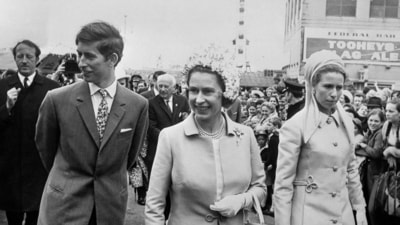 Queen Elizabeth II (centre) with Anne and Charles in 1970 as they passed through the crowds at the Royal Easter Show in Sydney. (PA) Queen Elizabeth II (centre) with Anne and Charles in 1970 as they passed through the crowds at the Royal Easter Show in Sydney. (PA)