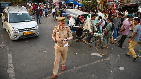 The nearest car park is Sector 18 multilevel and Botanical Garden parking. But both of them are two to three kilometres from the Atta Market. For five to 10 minutes of work, we are often forced to park on the roadside, said an Atta market visitor. (Sunil Ghosh/HT Photo)