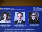 The Nobel memorial prize in economics awarded to Daron Acemoglu, Simon Johnson and James A Robinson, seen on screen, during a press meeting at the Royal Swedish Academy of Sciences in Stockholm, Sweden, Monday Oct. 14, 2024. (Christine Olsson/TT News Agency via AP/PTI) The Nobel memorial prize in economics awarded to Daron Acemoglu, Simon Johnson and James A Robinson, seen on screen, during a press meeting at the Royal Swedish Academy of Sciences in Stockholm, Sweden, Monday Oct. 14, 2024. (Christine Olsson/TT News Agency via AP/PTI)