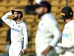 India's Virat Kohli (L) gestures during the India vs New Zealand first Test India's Virat Kohli (L) gestures during the India vs New Zealand first Test