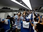 People dressed as zombies perform inside a "Zombie Shinkansen" bullet train bound for Osaka from Tokyo, inspired by the South Korean movie 'Train to Busan', ahead of the Halloween season, in Tokyo, Japan.