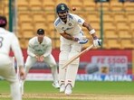 India's Virat Kohli plays a shot he is caught by New Zealand's Glenn Philips during the day two of the first cricket test match between India and New Zealand India's Virat Kohli plays a shot he is caught by New Zealand's Glenn Philips during the day two of the first cricket test match between India and New Zealand