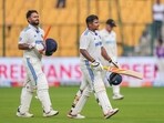 India's Sarfaraz Khan and Rishabh Pant walk off the field as rain stops play during the fourth day of the first Test. India's Sarfaraz Khan and Rishabh Pant walk off the field as rain stops play during the fourth day of the first Test.
