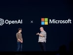 Kevin Scott, executive vice president of AI and chief technology officer of Microsoft Corp., right, and Sam Altman, chief executive officer of OpenAI, at the Microsoft Build event in Seattle, Washington, US, on Tuesday, May 21, 2024.