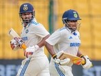 India's Rishabh Pant and Sarfaraz Khan run between the wickets