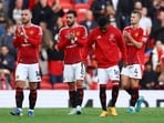 Manchester United's Christian Eriksen, Manchester United's Bruno Fernandes and Manchester United's Matthijs de Ligt applaud fans after the match