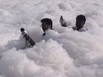 A TV reporter rode a boat through toxic white froth on the Yamuna, highlighting Delhi's pollution. A TV reporter rode a boat through toxic white froth on the Yamuna, highlighting Delhi's pollution.