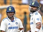Virat Kohli and Sarfaraz Khan during the third day’s play of the first Test at the M. Chinnaswamy Stadium in Bengaluru. (AFP) Virat Kohli and Sarfaraz Khan during the third day’s play of the first Test at the M. Chinnaswamy Stadium in Bengaluru. (AFP)