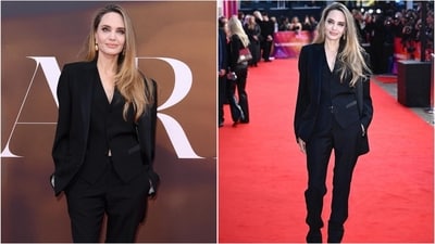 Angelina Jolie exudes boss babe vibes in a three-piece black pantsuit featuring a waistcoat, oversized blazer and fitted trousers. (Instagram) Angelina Jolie exudes boss babe vibes in a three-piece black pantsuit featuring a waistcoat, oversized blazer and fitted trousers. (Instagram)