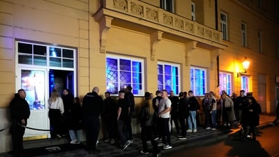 A group of tourists stand in line outside a bar as they attend a pub crawl tour in downtown Prague, Czech Republic. No more ‘alco-tourism’: Prague says goodbye to late-night pub crawls (AP Photo/Petr David Josek) A group of tourists stand in line outside a bar as they attend a pub crawl tour in downtown Prague, Czech Republic. No more ‘alco-tourism’: Prague says goodbye to late-night pub crawls (AP Photo/Petr David Josek)