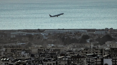 An aircraft of Middle East Airlines (MEA), Lebanon's flag carrier, takes off from Beirut International Airport on October 19, 2024. After Israel in late September 2024 increased its air strikes against Lebanese militant group Hezbollah, most airlines stopped flying to the country. National carrier Middle East Airlines is the only company still flying out of Beirut despite the mounting risks and experience of runways being hit in the past. (Photo by AFP) (AFP) An aircraft of Middle East Airlines (MEA), Lebanon's flag carrier, takes off from Beirut International Airport on October 19, 2024. After Israel in late September 2024 increased its air strikes against Lebanese militant group Hezbollah, most airlines stopped flying to the country. National carrier Middle East Airlines is the only company still flying out of Beirut despite the mounting risks and experience of runways being hit in the past. (Photo by AFP) (AFP)