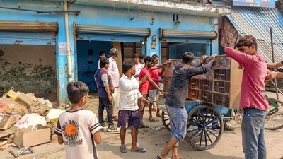 Locals vacate their shops after public works department (PWD) pasted notices on the properties of several people asking them to remove any illegal construction and warning of action, in violence-hit Maharajganj area of Bahraich, UP (PTI) Locals vacate their shops after public works department (PWD) pasted notices on the properties of several people asking them to remove any illegal construction and warning of action, in violence-hit Maharajganj area of Bahraich, UP (PTI)