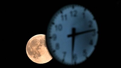 The brightness and beauty of the Hunter's Moon attract the attention of both astronomers and casual skywatchers alike. (Photo by Sergei GAPON / AFP)
