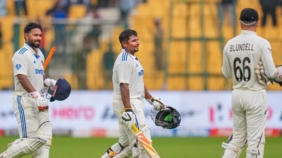 Bengaluru: India's Sarfaraz Khan and Rishabh Pant walk off the field as rain stops play during the fourth day of the first test cricket match between India and New Zealand at M Chinnaswamy Stadium, in Bengaluru, Saturday, Oct 19, 2024. (PTI Photo/Shailendra Bhojak) (PTI10_19_2024_000078A) (PTI) Bengaluru: India's Sarfaraz Khan and Rishabh Pant walk off the field as rain stops play during the fourth day of the first test cricket match between India and New Zealand at M Chinnaswamy Stadium, in Bengaluru, Saturday, Oct 19, 2024. (PTI Photo/Shailendra Bhojak) (PTI10_19_2024_000078A) (PTI)