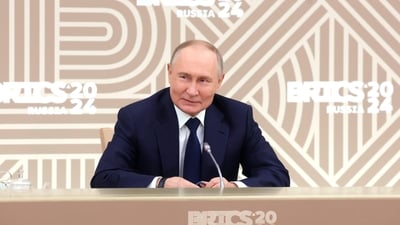 Russian president Vladimir Putin during a media conference ahead of the BRICS summit (AP)