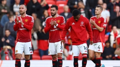 Manchester United's Christian Eriksen, Manchester United's Bruno Fernandes and Manchester United's Matthijs de Ligt applaud fans after the match (REUTERS)