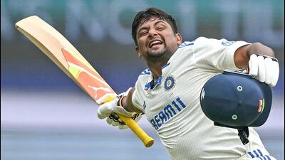Sarfaraz Khan celebrates after scoring a century against New Zealand in Bengaluru on Saturday. (AFP) Sarfaraz Khan celebrates after scoring a century against New Zealand in Bengaluru on Saturday. (AFP)