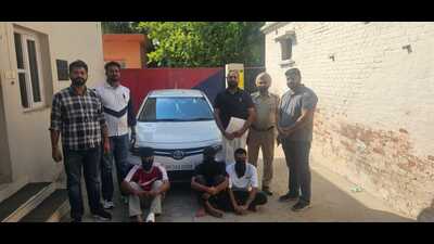 The accused in the custody of Zirakpur police. The snatched car was recovered from them. (HT Photo)
