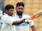 Bengaluru, Oct 19 (ANI): India's Rishabh Pant congratulates teammate Sarfaraz Khan as he celebrates his century during Day 4 of the first test match against New Zealand, at M.Chinnaswamy Stadium in Bengaluru on Saturday. (ANI Photo) Bengaluru, Oct 19 (ANI): India's Rishabh Pant congratulates teammate Sarfaraz Khan as he celebrates his century during Day 4 of the first test match against New Zealand, at M.Chinnaswamy Stadium in Bengaluru on Saturday. (ANI Photo)